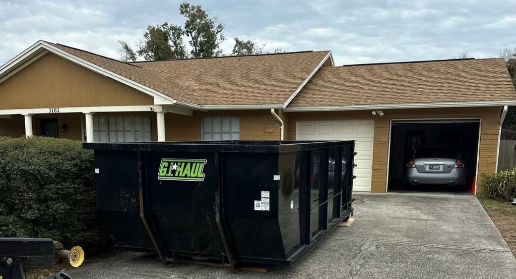 Dumpster in residential driveway