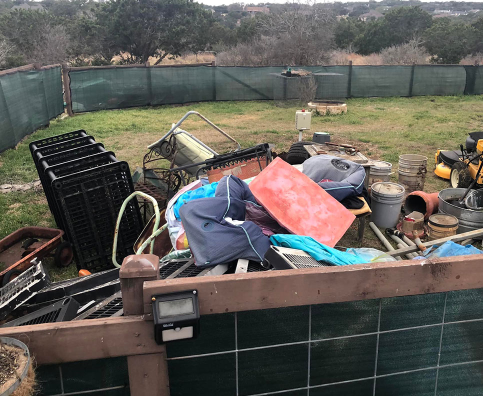 pile of garbage in backyard