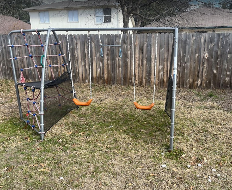 before swing set removal and haulaway