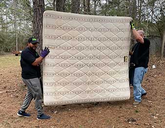 gihaul crew hauling away mattress