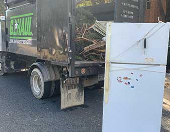refrigerator needing hauled away by gihaul