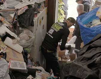 gihaul crew inside hoarder home