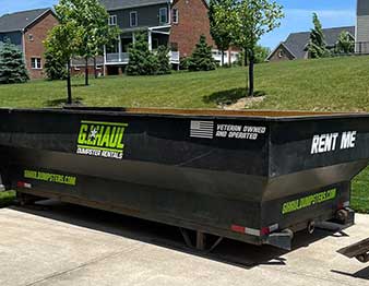 gihaul residential dumpster in driveway
