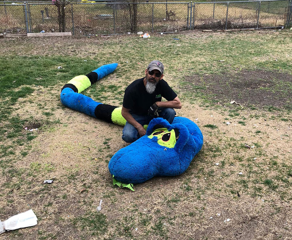 large stuffed animal found in yard during cleanup